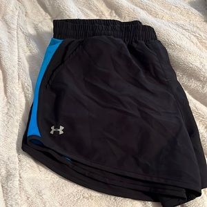 Under Armour shorts with pockets - built in liner- blue stripe on side - Size L